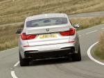 BMW 5-Series GT with M Sport Package 2011 года (UK)
